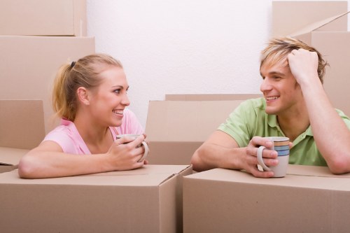 Movers handling a residential move in Vauxhall with boxes and furniture