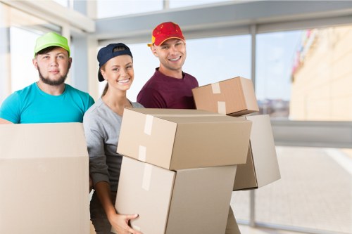 Removal team helping with a move in a Vauxhall apartment area
