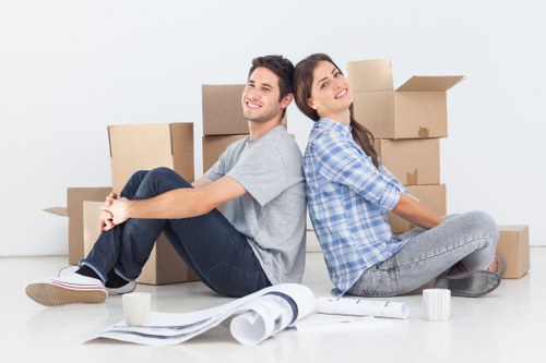 Professional movers handling boxes and furniture during a Vauxhall removal service