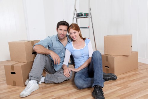 Local moving team loading furniture for transport near Vauxhall