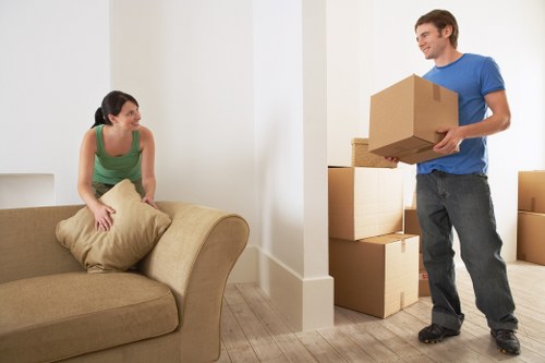 Packed boxes and furniture ready for transport in a Vauxhall flat